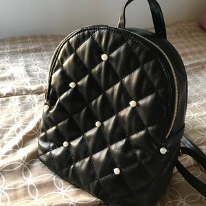 Mini black backpack